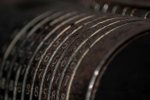 Closeup of an old vintage cash register with lots of numbers