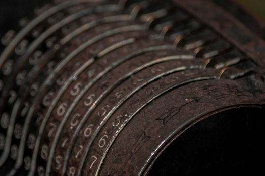 Closeup of an old vintage cash register with lots of numbers