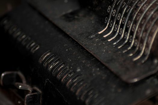 Closeup of an old vintage cash register with lots of numbers