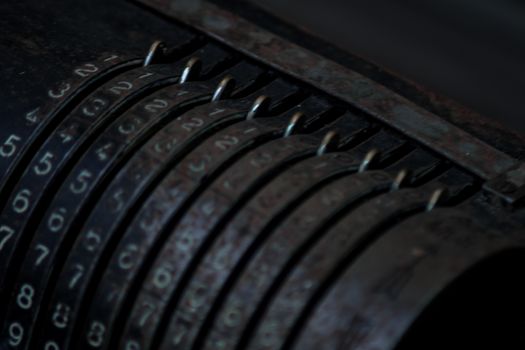 Closeup of an old vintage cash register with lots of numbers