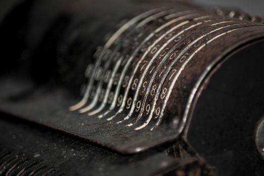 Closeup of an old vintage cash register with lots of numbers