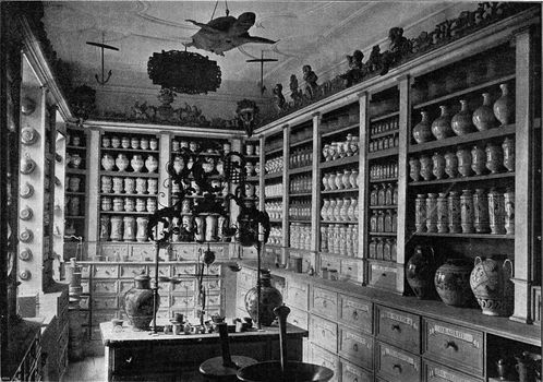 Installation of an old pharmacy in the National Germanic Museum of Nuremberg, vintage engraved illustration. From the Universe and Humanity, 1910.
