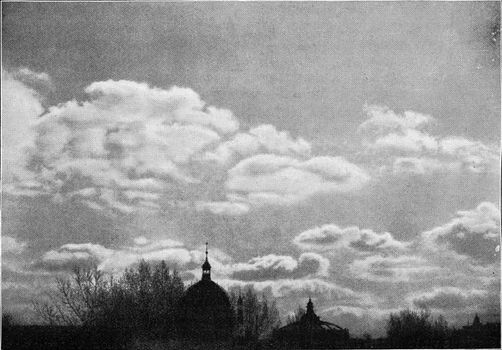 Cumulus in the evening, vintage engraved illustration. From the Universe and Humanity, 1910.
