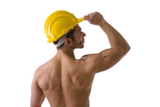 Muscular young construction worker shirtless with hardhat, isolated on white background, rearview