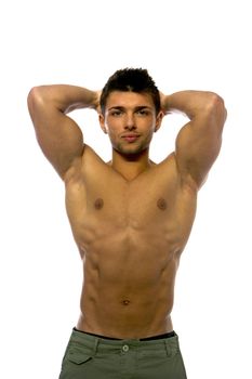 Cute muscular ripped young bodybuilder with hands behind his head, looking away. Isolated on white
