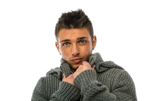 Good looking young man wearing winter hoodie sweater on shirt