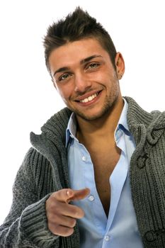 Good looking young man wearing winter hoodie sweater on shirt, smiling to camera