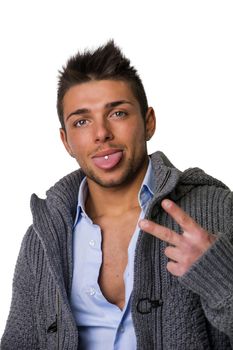 Good looking young man wearing winter hoodie sweater on shirt, smiling to camera