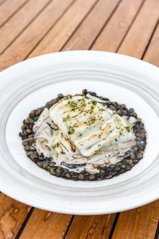 grilled squids with lentils nut mediterranean food cuisine