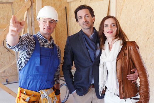 Foreman shows new house to a young couple