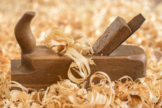 Old wooden hand plane for woodworking.