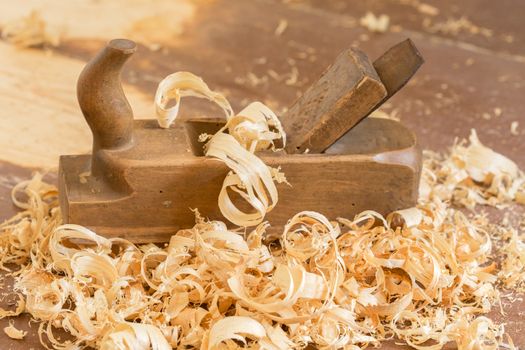 Old wooden hand plane for woodworking.