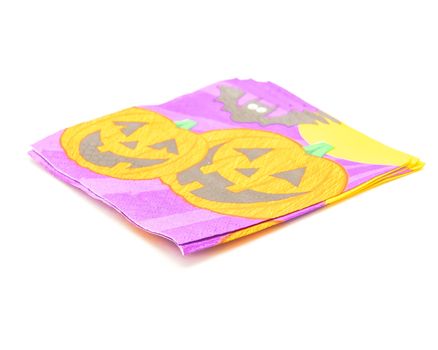 Three friendly Halloween napkins isolated on white background. Festive party tissues display pumpkins, bats, jack-o-lantern