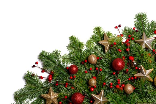 Christmas Border frame of tree branches on white background with copy space isolated, red and golden decor, berries, stars