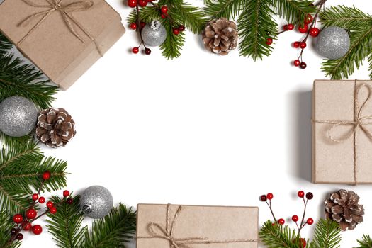 Christmas background with balls and decorations of holly berry, cones, gifts, balls on white