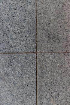 gray pointy and dirty pavement stone square parts centered with good composition. photo has taken from izmir/turkey.