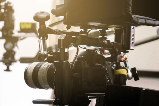 Film industry. Filming with professional camera background