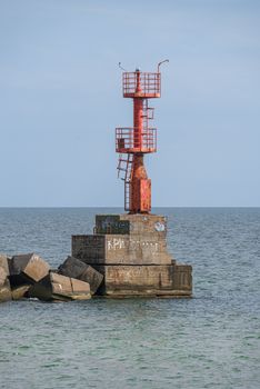 Grigoryevka, Ukraine - 05.09.2019. The lighthouse at the entrance to Adzhalyk estuary from the Black Sea. Sea gate to the South Trade Port in Ukraine