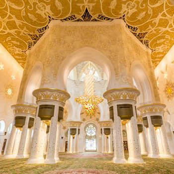 Rich artistic islamic interior of Sheikh Zayed Grand Mosque in Abu Dhabi, United Arab Emirates.