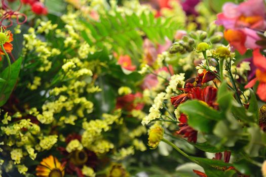 Detail photograph of a colourful lush floral arrangement