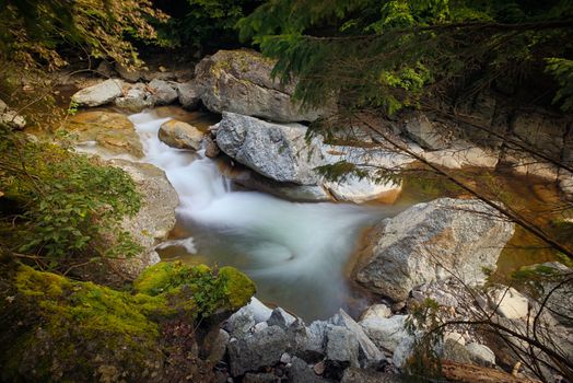 Waterfall and stones in National Park, Vrancea, Romania