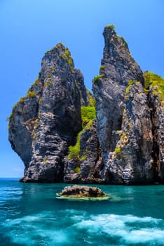 Rocks cliffs in the sea, Ko Yung island, Phi Phi, Andaman sea, Krabi, Thailand