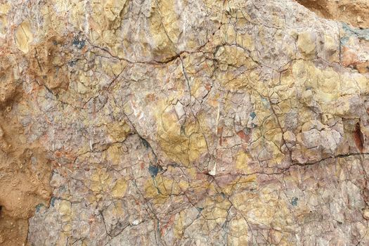 Texture of colorful Mediterranean stone on the shore