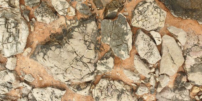 Texture of colorful Mediterranean stone on the shore