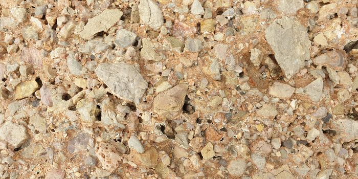 Texture of colorful Mediterranean stone on the shore