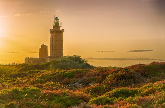 Romantic sunset in France sea coast travel attraction lighthouse
