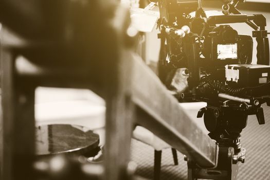 Film industry. Filming with professional camera background