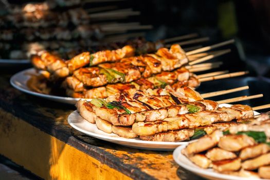 Cchicken sticks at at Nishiki market in Kyoto, Japan