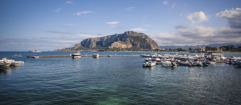 View of Mondello where you can see sea boats and the whole panorama in the background. Panoramic Image