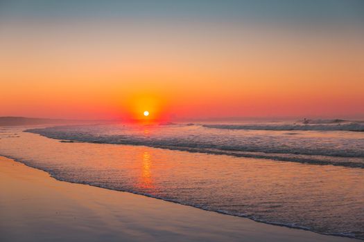 Beautiful sunset at the Portugal beach