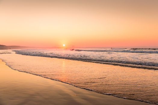 Beautiful sunset at the Portugal beach