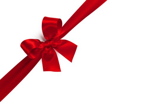 Red gift bow isolated on white background