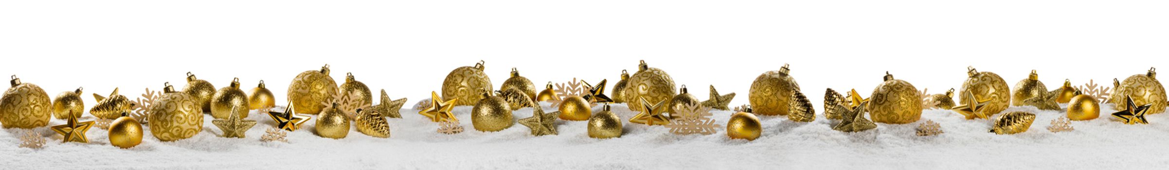 Christmas border with golden ornaments on snow isolated on white background