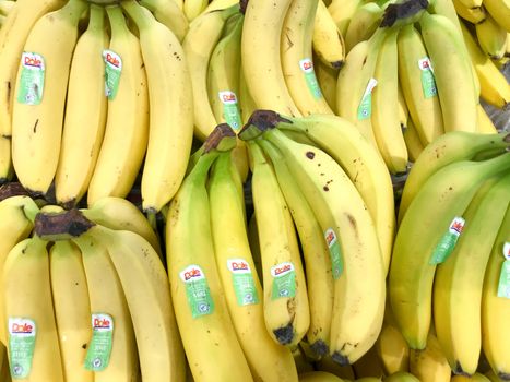 Pomorie, Bulgaria - September 12, 2019: Close-Up Of Fresh Bananas Background.