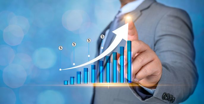 Graph of financial growth global communications Binary Smart Phones and world Internet Businesspeople press the phone to communicate in the Internet Stock chart Researching process.business Team Working Startup modern office Laptop global strategy virtual Icon.Innovation graphs Interfaces