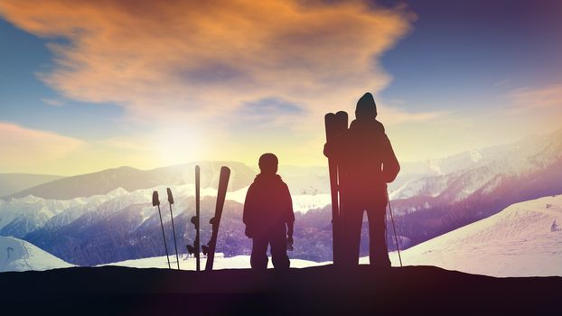 Father and son are standing on the top of a mountain in the background of a bright sunset.