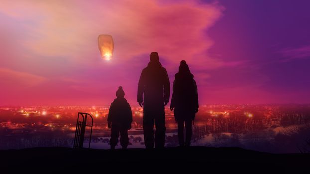 A family standing on a hill is launching a Chinese lantern on the background of a night city.