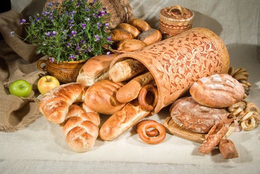 Different kinds of bread on a studio background