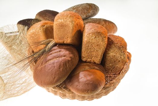Different kinds of bread on a studio background