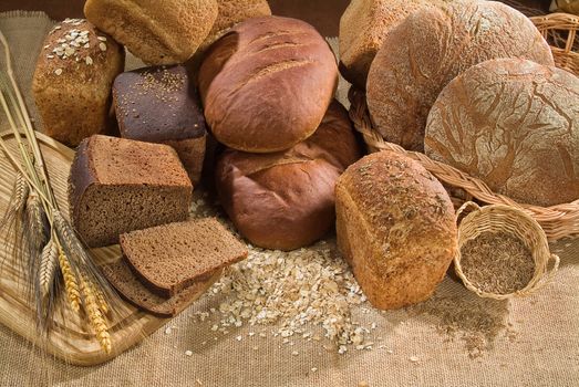 Different kinds of bread on a studio background