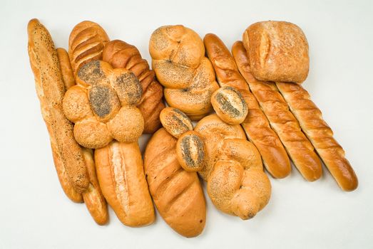Different kinds of bread on a studio background