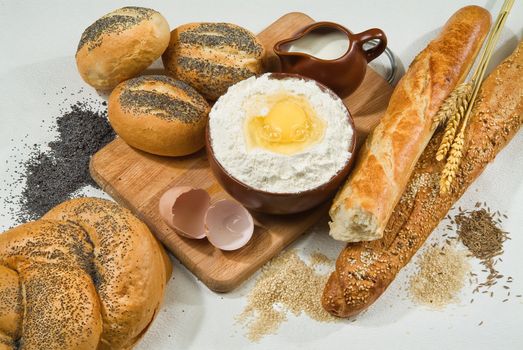 Different kinds of bread on a studio background