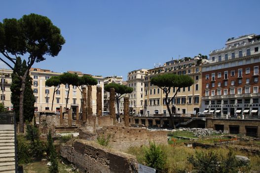 Photo of Archaeological site close to where Julius Caesar was killed. Placed among modern apartment buildings at Largo di Torre Argentina street, Rome, Italy