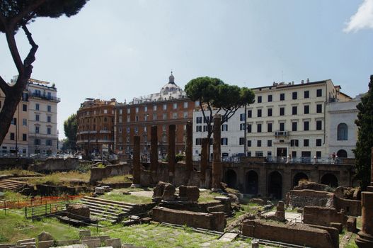 Photo of Archaeological site close to where Julius Caesar was killed. Placed among modern apartment buildings at Largo di Torre Argentina street, Rome, Italy