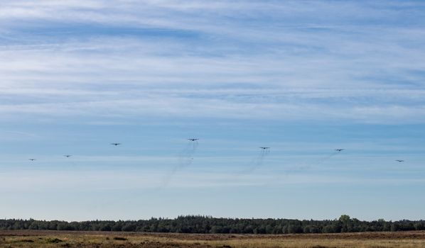 Ede,20-sep-2019:the dakota and hercules planes are approaching the heathland for dropping the paratroopers on the occasion of operation airborn, commemoration of market garden