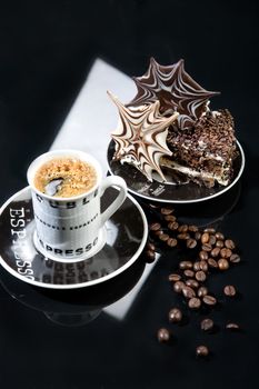 Coffee and chocolate cake on a glass